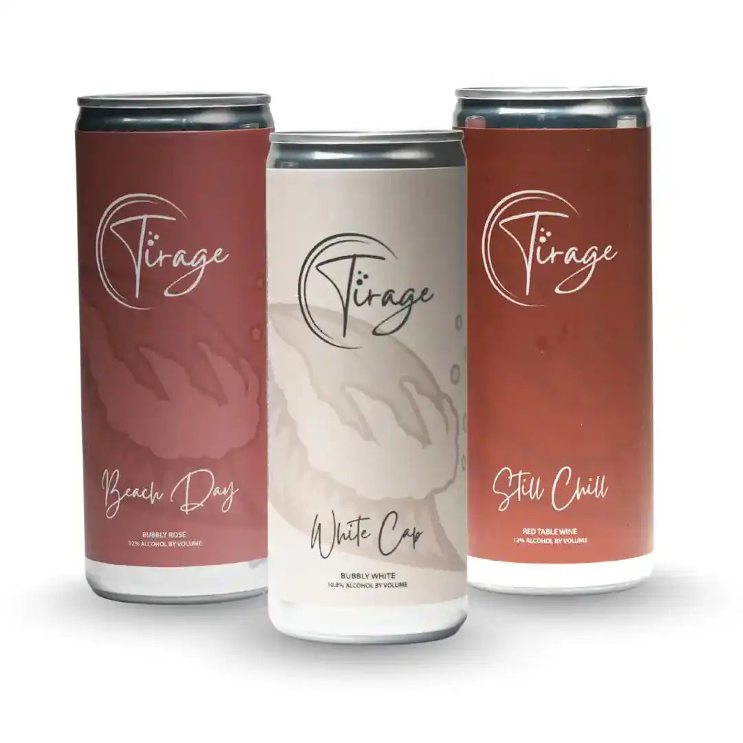 Three Tirage wine cans labeled 'Beach Day', 'White Cap', and 'Still Chill' on a white background.